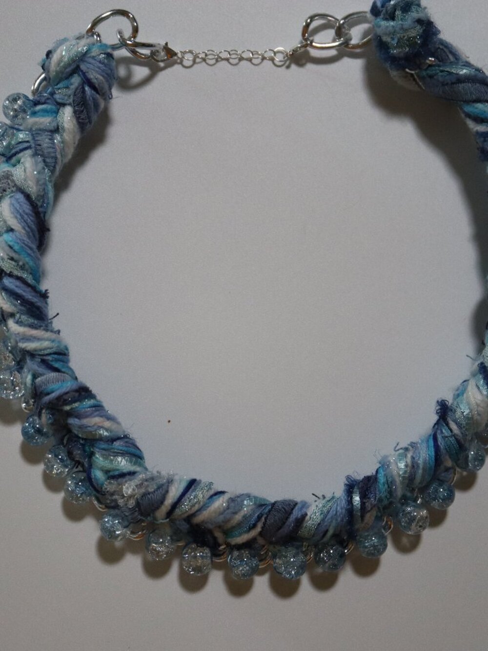 Necklace hand made, braided, beaded shades of blue